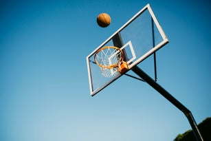 Basketball ball getting in to the basket
