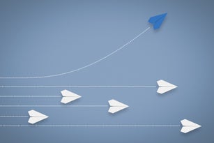 Paper Airplane Different Direction and Approach. Think Different & Leadership Concept.