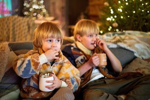 Little boys with cocoa cups