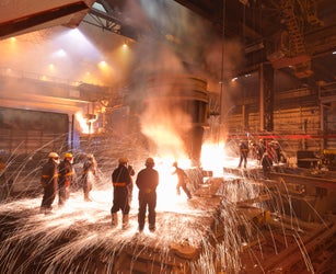 Workers With Molten Steel In Plant