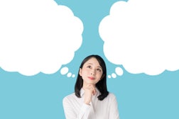 Thinking asian woman.