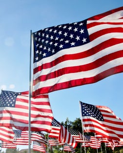United States flags blow in the wind in Malibu, CA