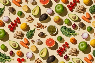 Pattern of variety fresh of organic fruits and vegetables and healthy vegan meal ingredients on beige background. Healthy food, clean eating, diet and detox, eco friendly, no plastic concept . Flat lay, top view