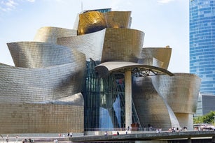 Building of the Guggenheim Museum from the other side of the river view in Bilbao Spain