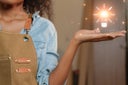 Woman touch Icon light bulb with brain glowing. Creative new ideas and innovation