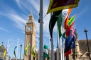 Big Ben clock tower and flags from the Commonwealth of Nations