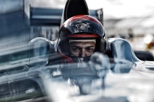 Racer sitting in car