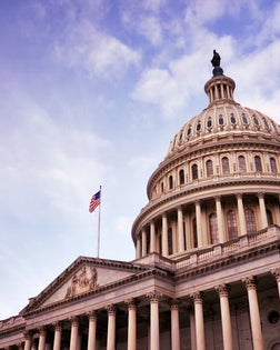 US Capitol building dome with American flag