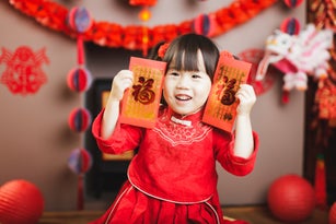 Chinese baby girl with traditional dressing up celebrate Chinese new year