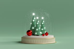 Christmas trees and balls under snow in a glass dome. Creative still life with copy space