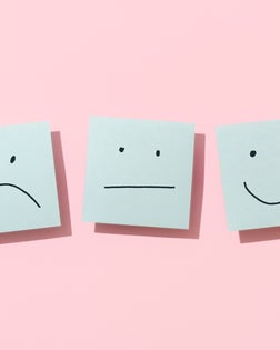 Three Blue Sticky Blank Notes On Pink Background