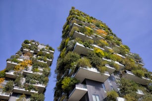 Skyscrapers with trees and plants on balconies, Milan, Italy