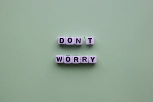 Don't worry words on mint background. Positive thinking concept. Motivational poster.