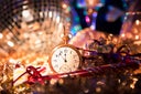 New Year's Eve holiday party, pocket watch, clock at midnight.