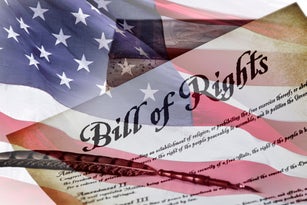 Bill of Rights amendments with Vintage Book and a Quill Pen