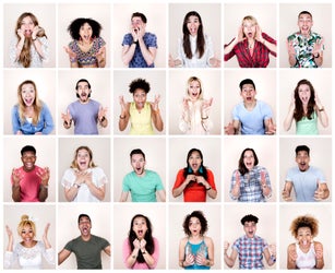 Group portrait of people looking surprised