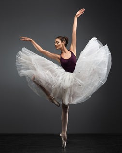 Movement of beauty. Elegant gesture of legs and hands of ballet dancer. Woman and dance art.