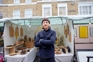 Small business portrait of a market stall vendor