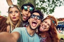 Group of friends having fun at a music festival