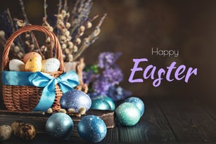 Happy Easter. Congratulatory easter background. Easter eggs and flowers. Selective focus.