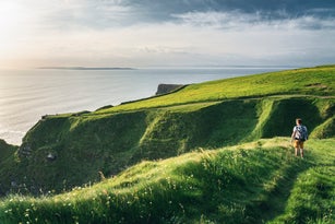 Man at the Cliffs of Moher, Ireland.
