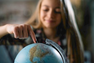 Beautiful young girl discovering world