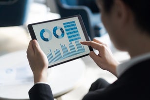 business report on digital tablet