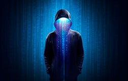 Faceless hackers and malware hackers use laptops with dangerous digital code on binary code background.