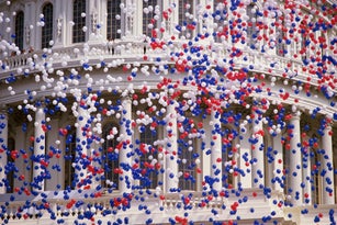 Detail of Capitol Building with red, white, and blue balloons