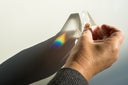 Breaking and dispersion of natural light in a prism, beautiful rainbow colors.