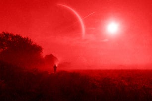 A moody science fiction concept, of a man looking at a ringed planet. On a foggy spooky night. With a grunge, artistic edit