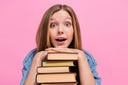 Close up photo of astonished impressed lady hand under chin wear stylish clothes discount sale bookstore isolated on pink color background