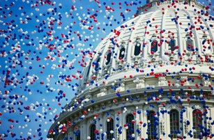 'This is the U.S. Capitol during the Bicentennial of the Constitution Celebration. There are red, white and blue balloons falling around the Capitol Dome. It marks the dates that commemorate the Centennial 1787-1987.'