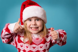Santa's Little Helper Giving Thumbs Up Sign