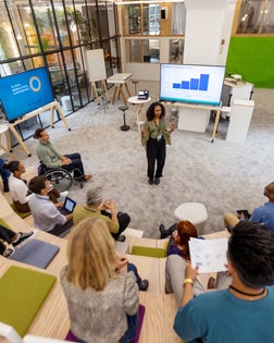African woman addressing audience at startup launch event