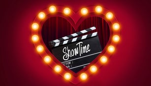 Showtime.Handwriting on film slate.storytelling inspiration Screenwriting and Filmmaking for Love story in valentine's day.Broadway theatre, show performance in the background.