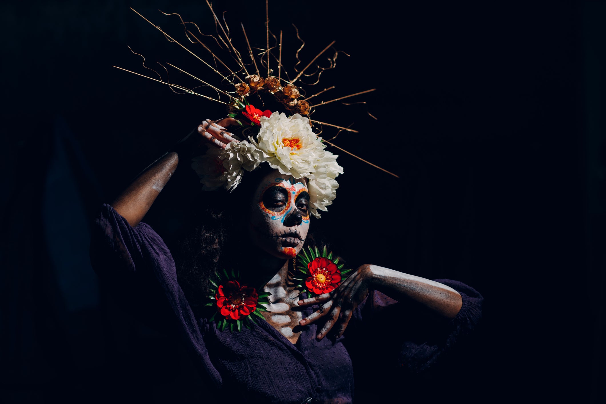 Woman with mexican halloween makeup on her face