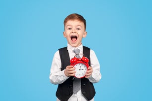 Excited boy being late to studies