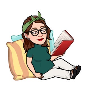 Teacher on floor with a book