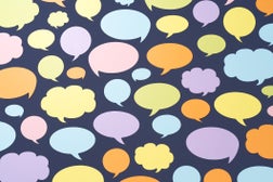 A Variety of Colorful Paper Chat Bubbles on Purple