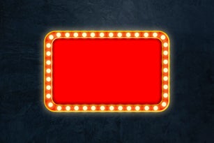 Red shining marquee empty banner on dark concrete wall