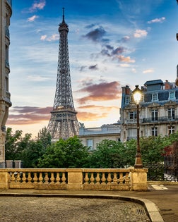 Eiffel Tower with Haussmann apartment Buildings in foreground, Paris, France