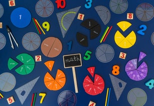 Colorful math fractions, numbers, letters on blue background. Interesting, fun, creative mathematics for kids. Education, back to school concept. Mathematical background