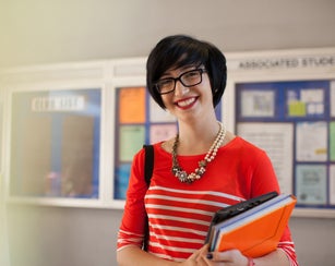 Student laughing in classroom