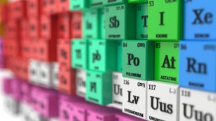 distorted periodic table concept. cubes colored by element groups. 3d illustration