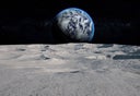 Moon surface with distant Earth and starfield