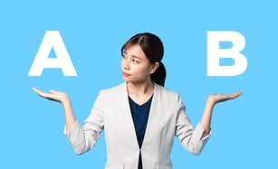 Young woman comparing with two things.