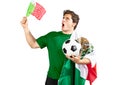 Young man with a soccer ball and a mexican flag after Shouting of emotion.