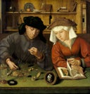 A picture of a main counting money alongside his wife.