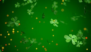 St. Patrick's Day Shamrock leaf falling with gold glitters . 3D render